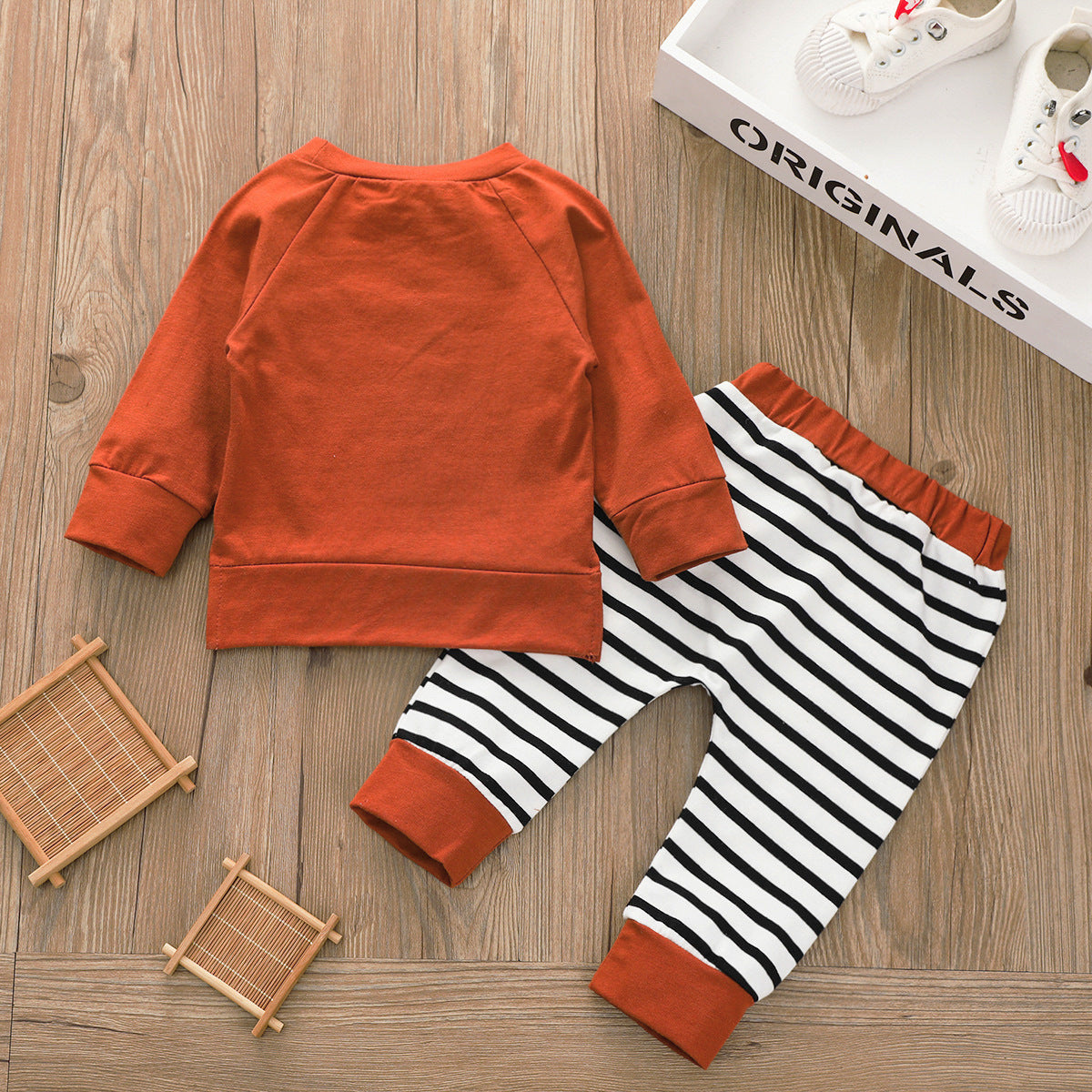 Two-piece solid color hoodie striped trousers